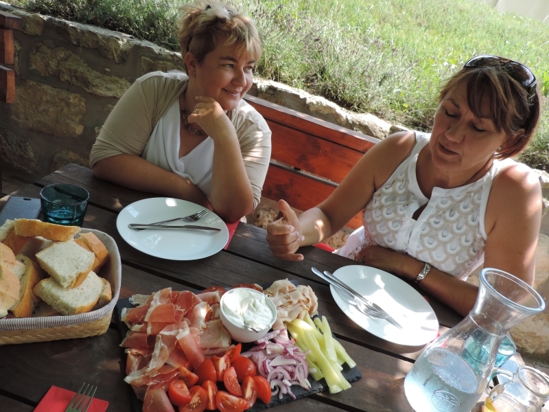 Eating a traditional cold cuts lunch on our wine tours Hungary