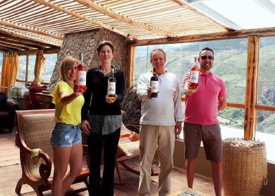 The owners of Apu Winery showing off their wares to Malka and Gary