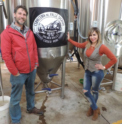 Malka with owner Juan proudly showing off his brewing process and branding